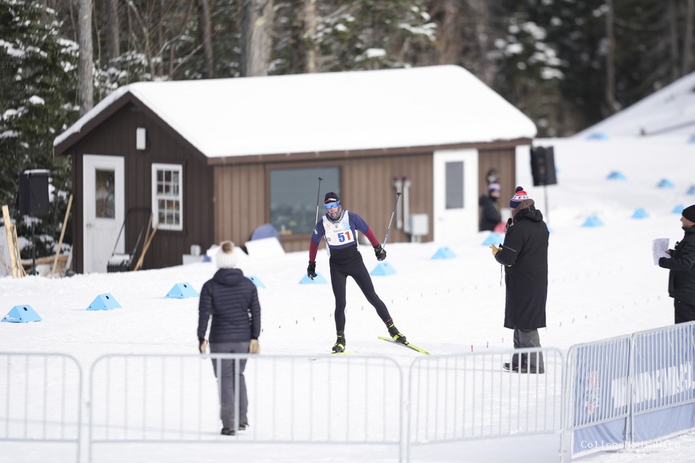 A group of athletes skiing in the snow