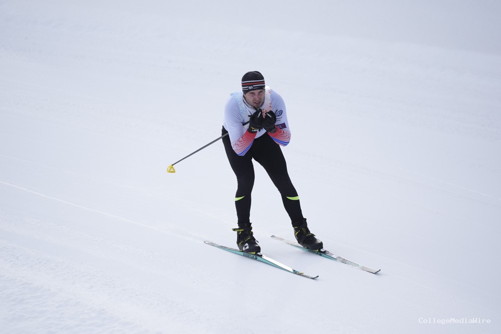 An athlete skiing in the snow
