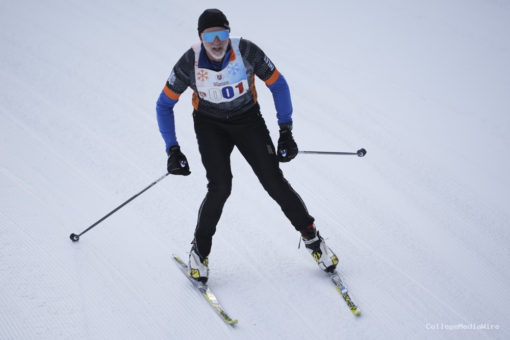 An athlete skiing in the snow