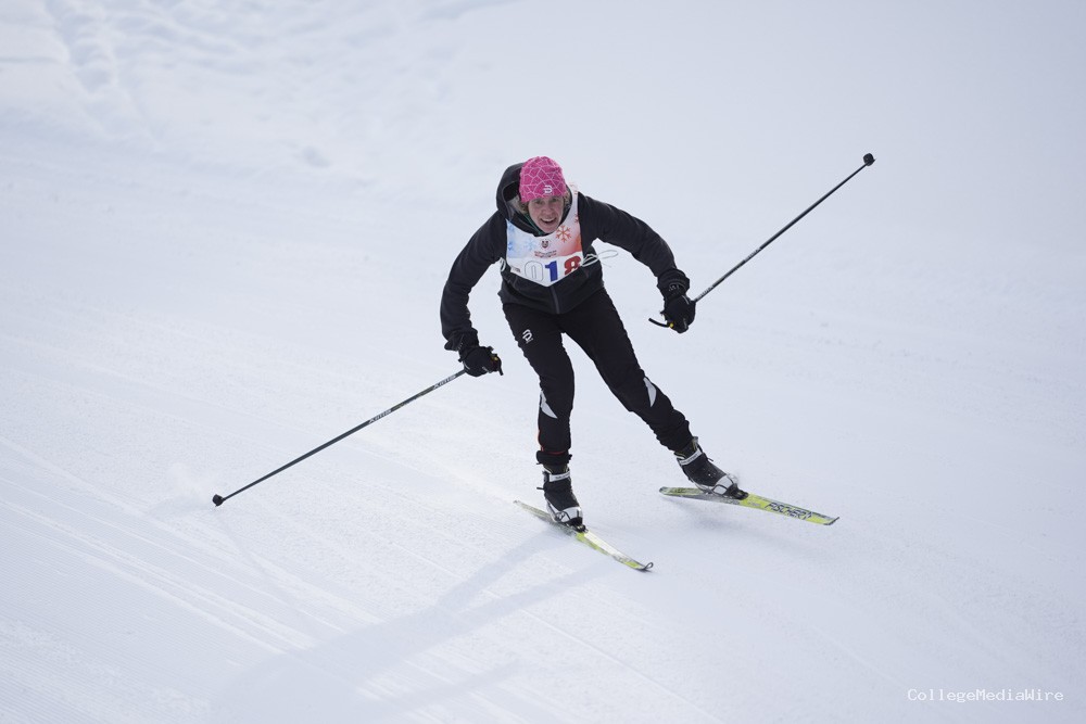 An athlete skiing in the snow