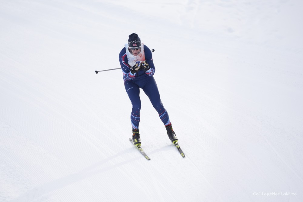 An athlete skiing in the snow