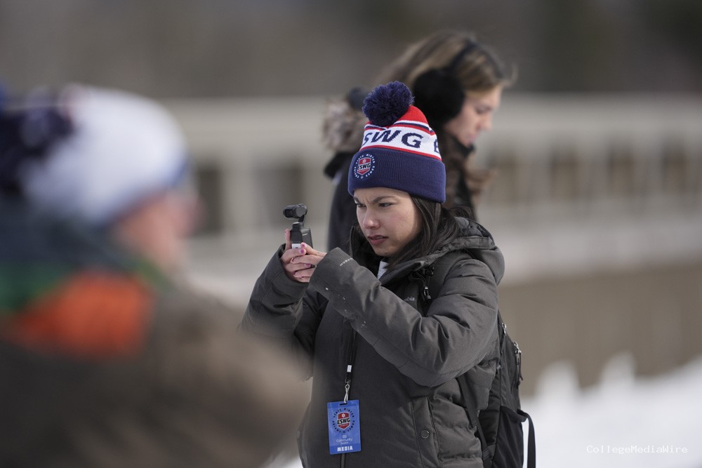 A group of athletes competing in athletic event sports outdoors