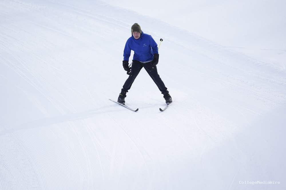 An athlete skiing in the snow